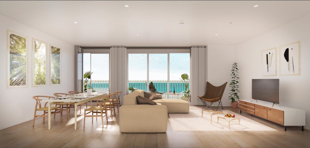 Interior del salón de uno de los apartamentos junto al mar en Barcelona de la promoción Torre Barceló de Stoneweg Living